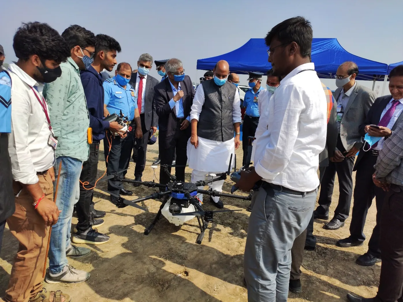 XDRPL team presenting a drone to dignitaries at Dundigal
