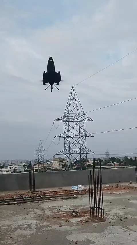 VisionTrack interceptor climbing past a transmission tower